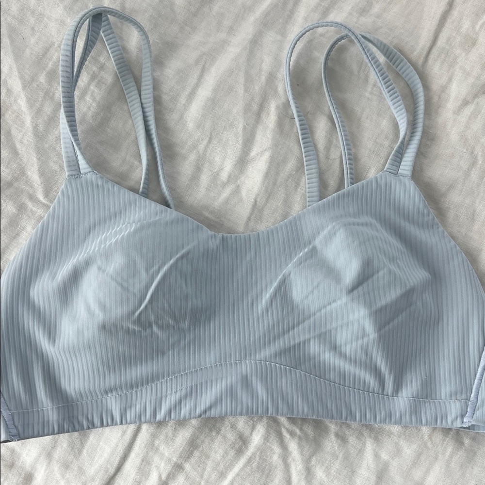 Lululemon light blue / gray sports bra.
